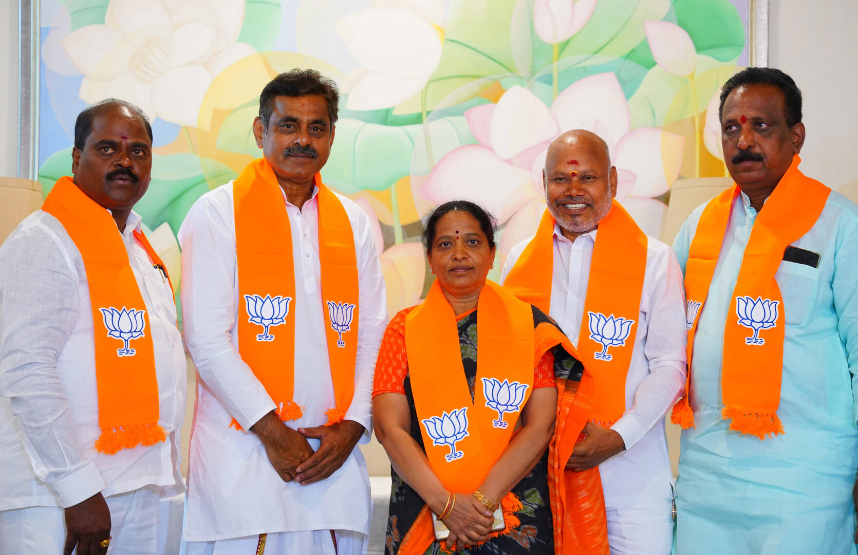 Four corporators each from Congress and BRS in Meerpet Municipality switch allegiance to BJP, significantly fortifying Vishweshwar Reddy's electoral prospects!