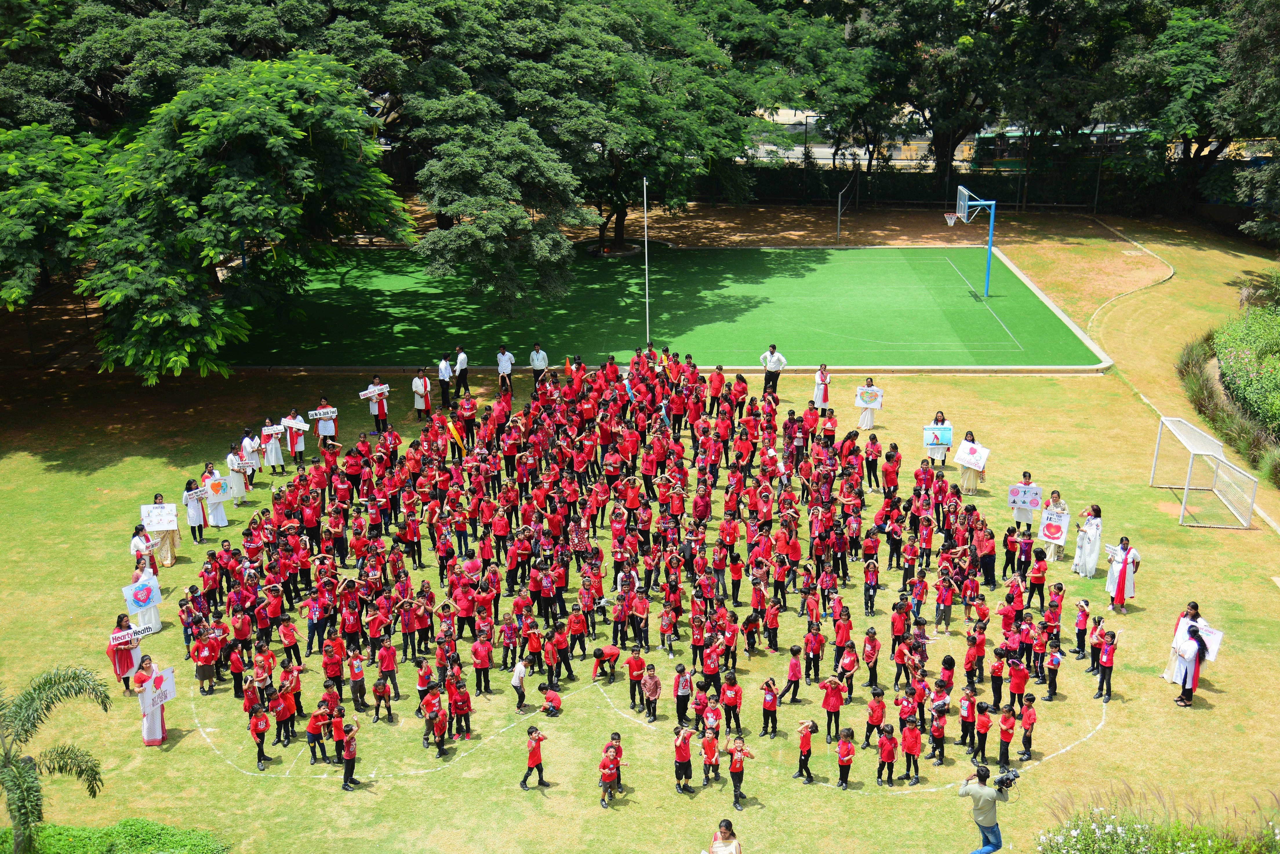 Ujjval World School Children Form Human Heart to Promote Healthy Heart on World Heart Day